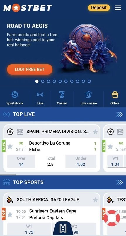 The Mostbet app on a phone, showing the sportsbook home screen with live football and cricket markets
